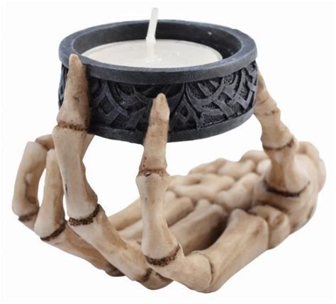 Mystical Illumination: The Allure of a Witch Hand Tealight Holder